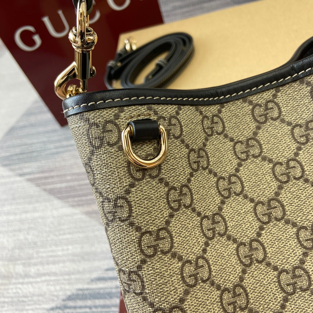 Gucci GG Emblem small bucket bag