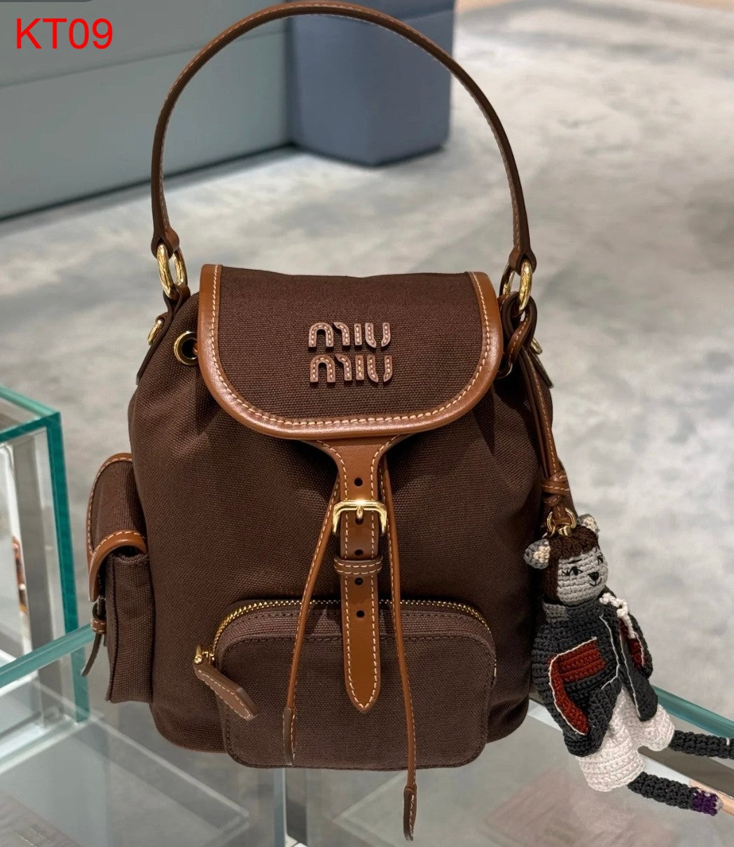 Miu Miu Canvas and leather backpack