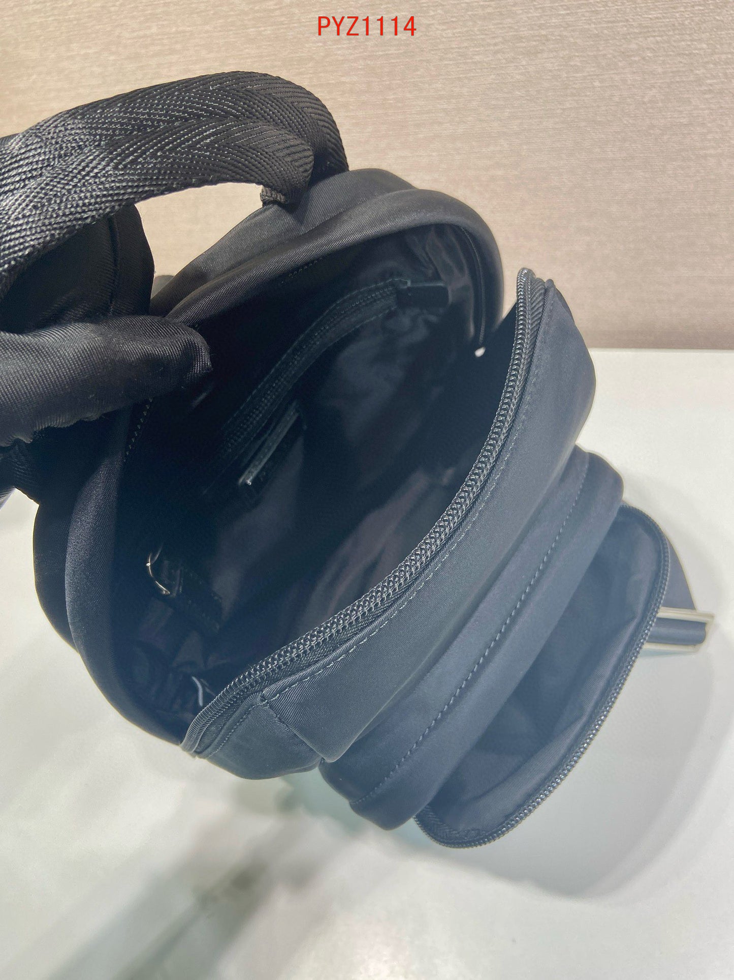 Prada Re-Nylon and Saffiano leather backpack