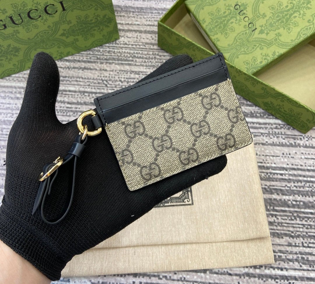 Gucci GG Emblem card case with strap