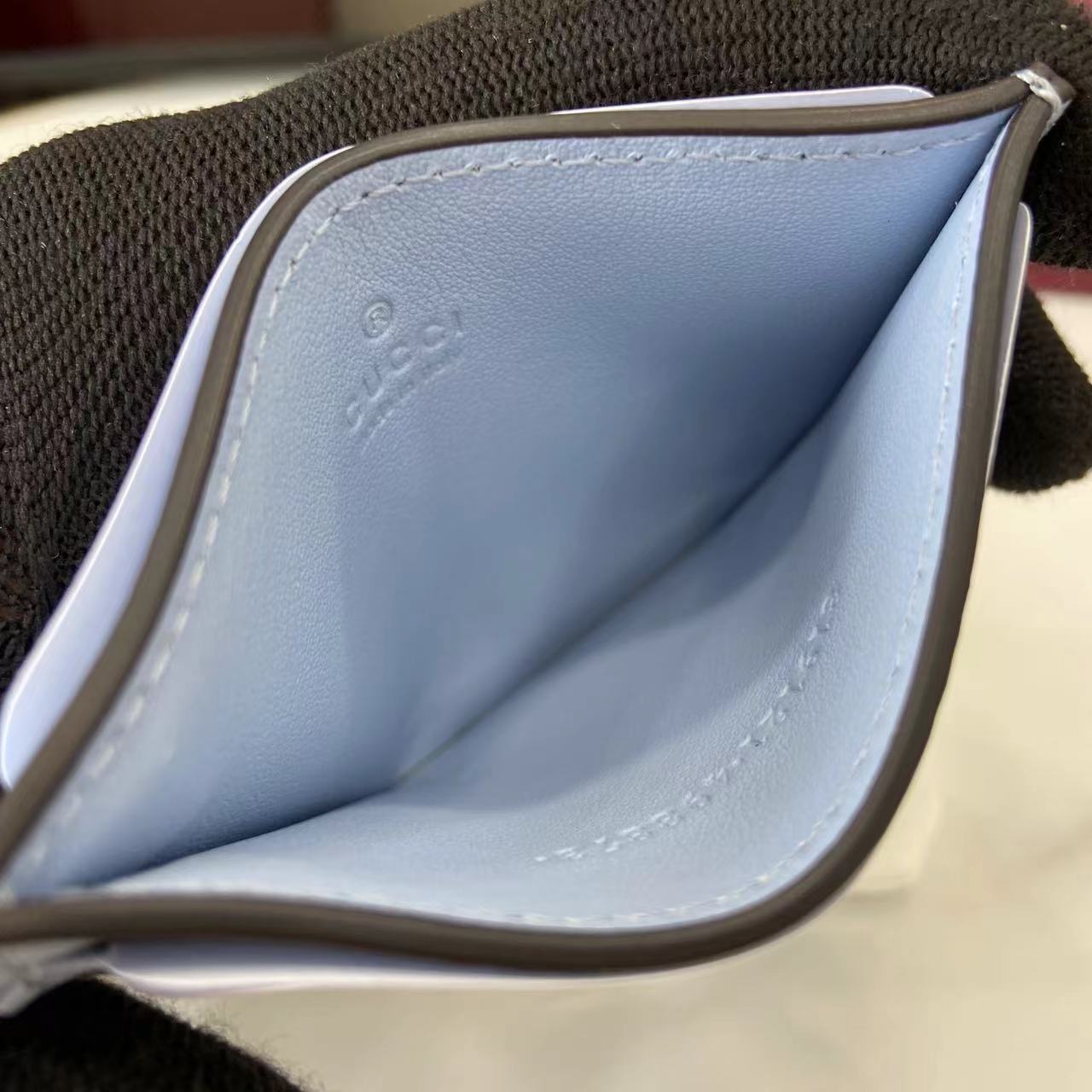 Gucci GG Emblem card case with strap