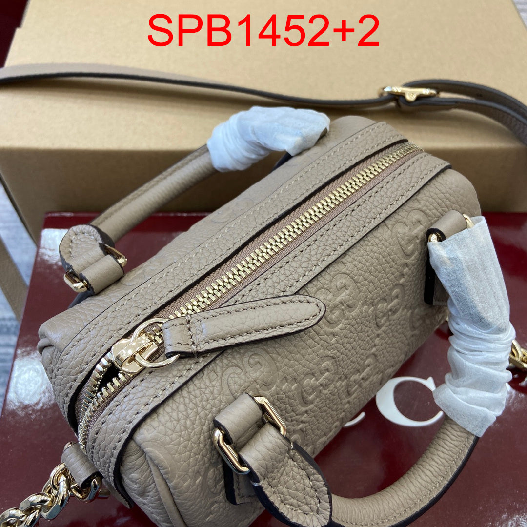 GG Emblem mini top handle bag