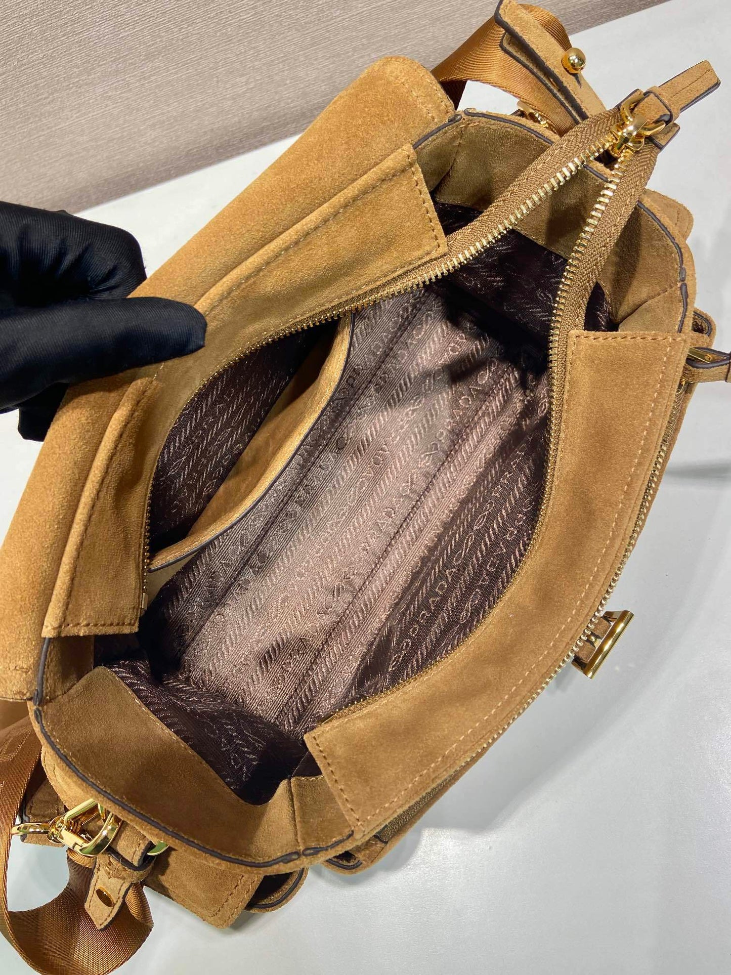 Prada Explore medium suede shoulder bag with fla