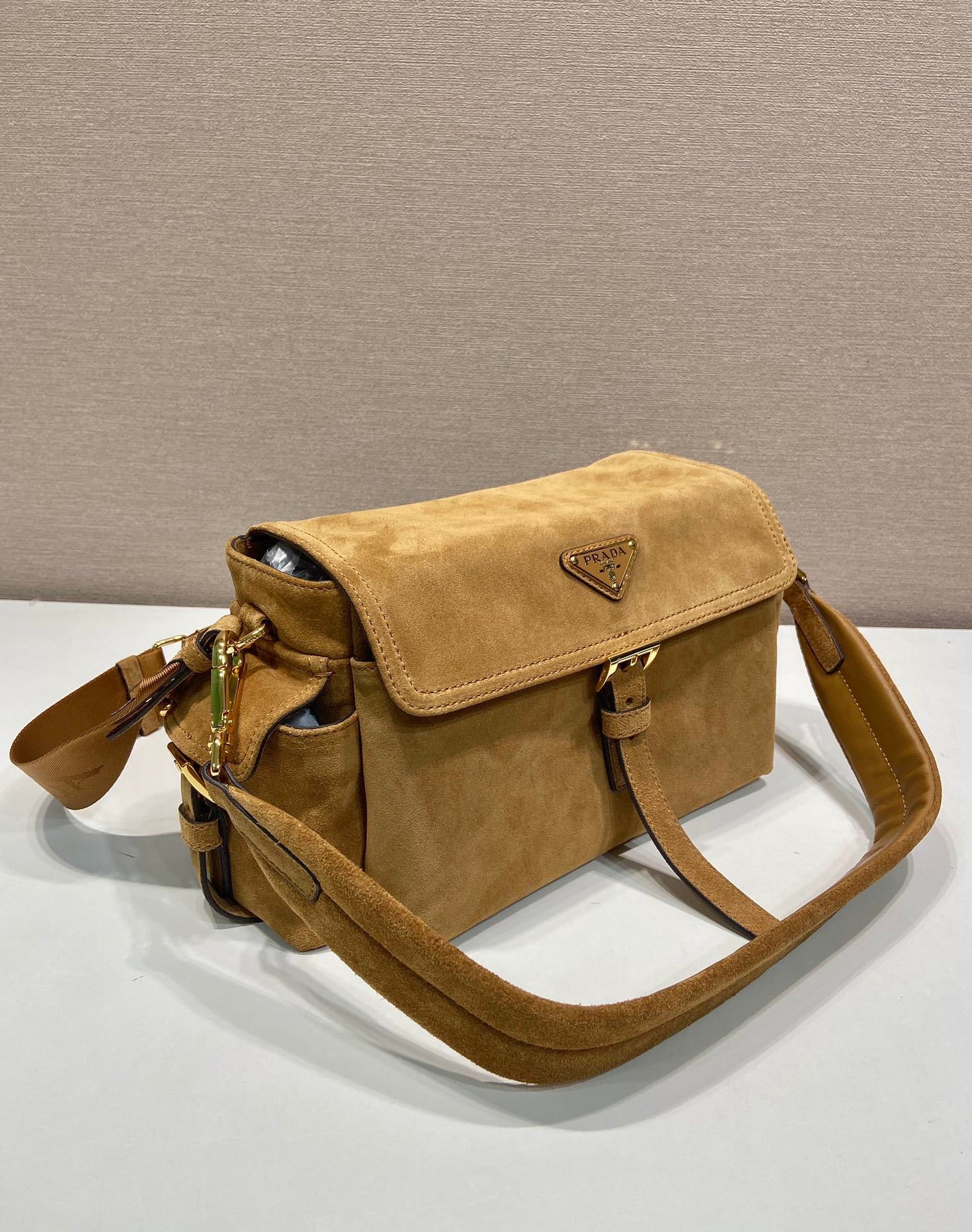 Prada Explore medium suede shoulder bag with fla