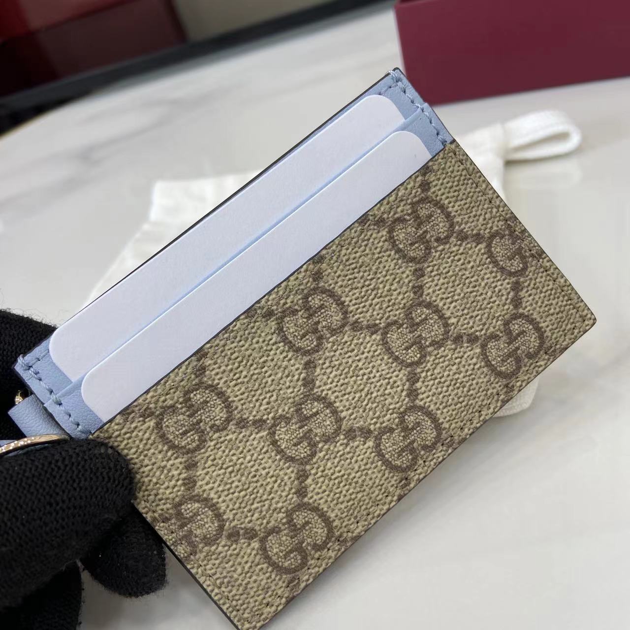 Gucci GG Emblem card case with strap