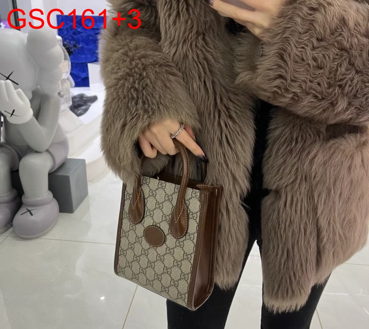 Gucci MINI TOTE BAG WITH INTERLOCKING G