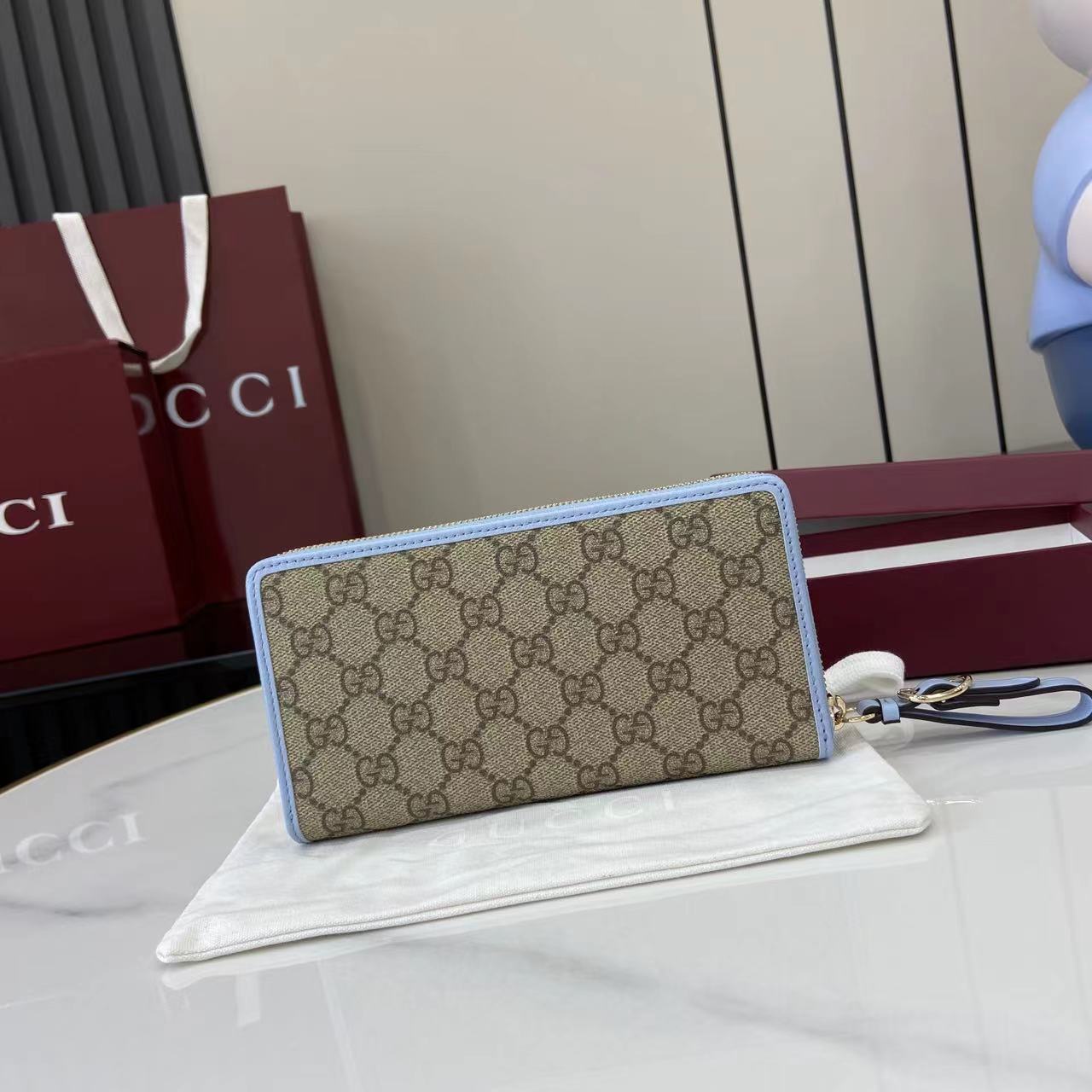 Gucci GG Emblem zip around wallet