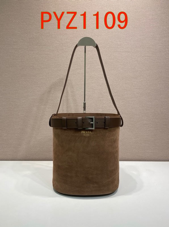 Prada Buckle suede bucket bag with jeweled belt
