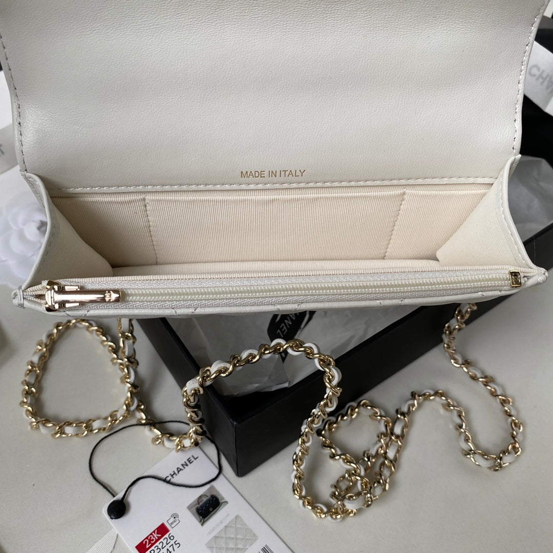 Chanel top handle flap bag