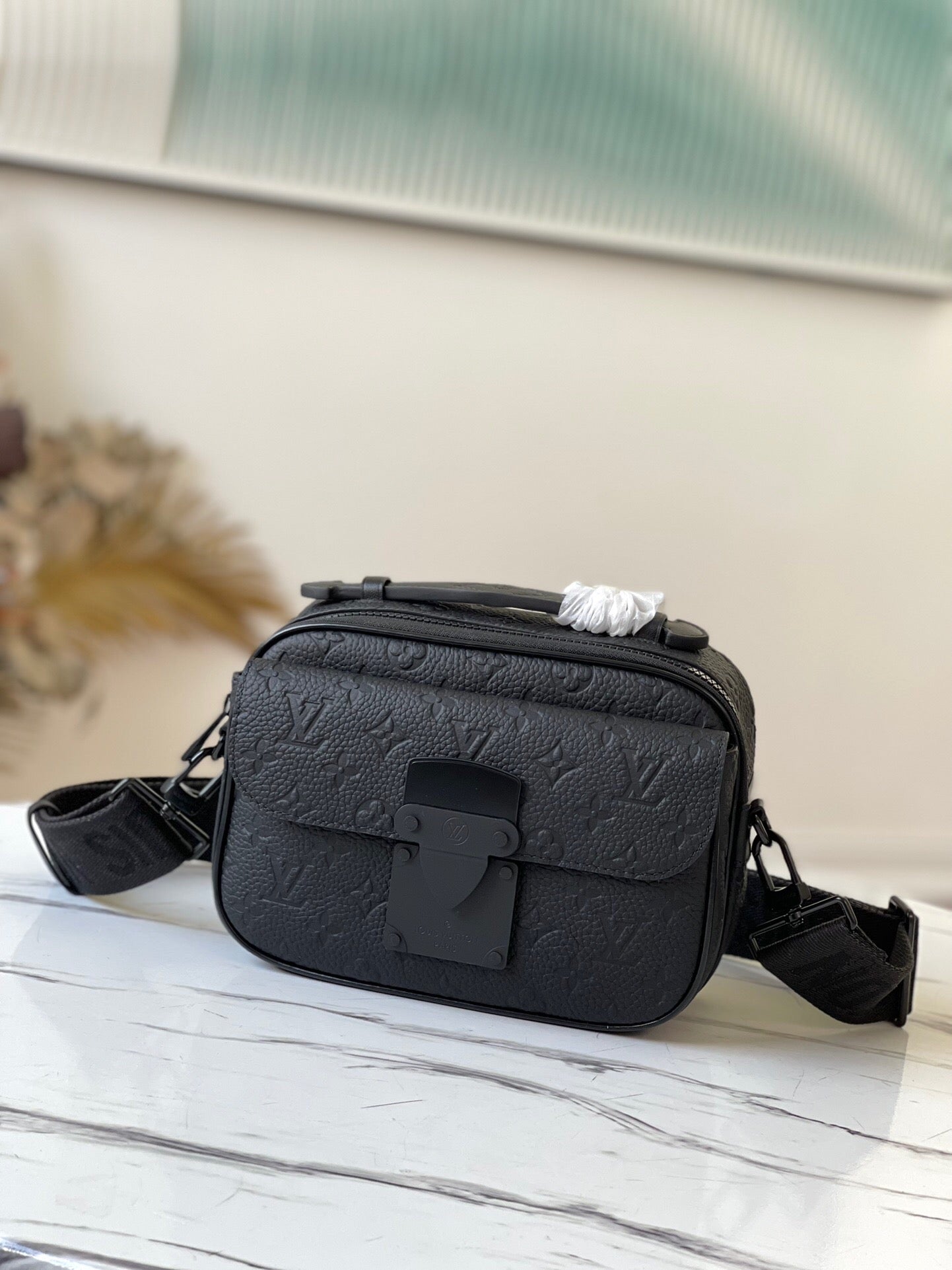 Louis Vuitton S lock Messenger bag