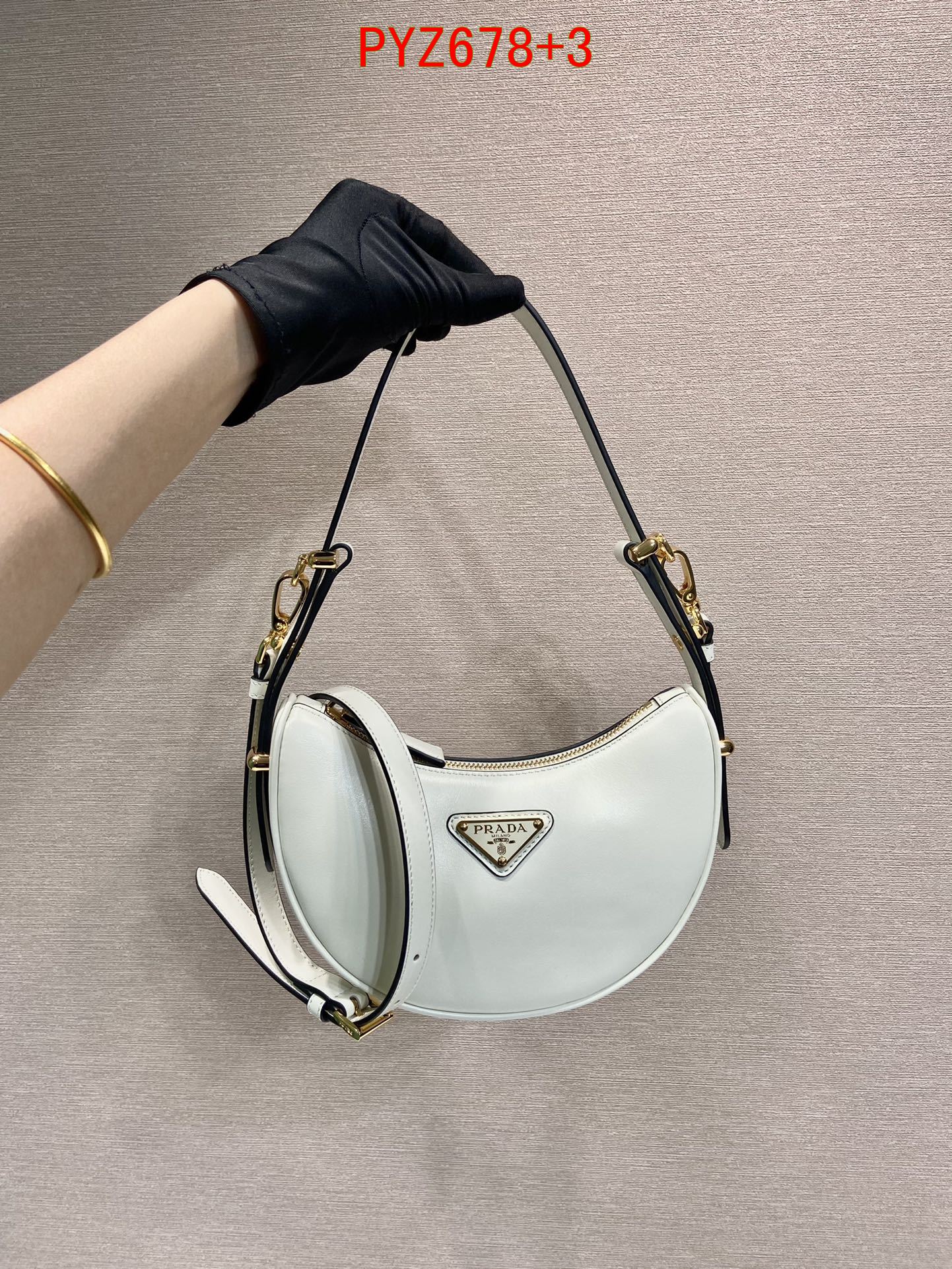 Prada Arqué leather mini shoulder bag