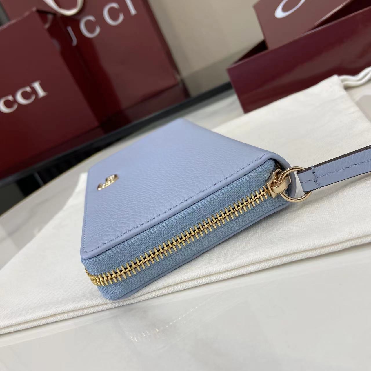 Gucci Bi-color GG Marmont zip around wallet