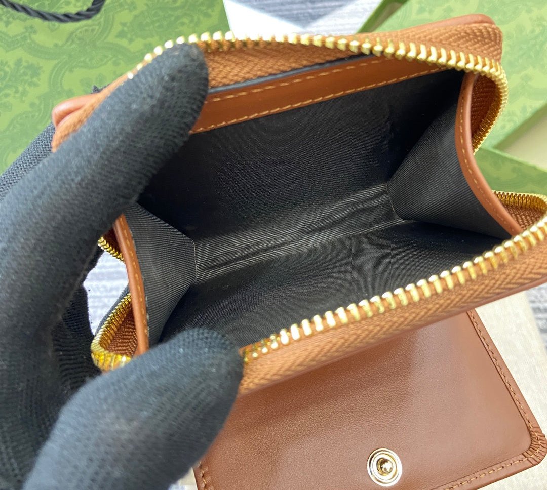 Gucci GG Emblem zip mini wallet