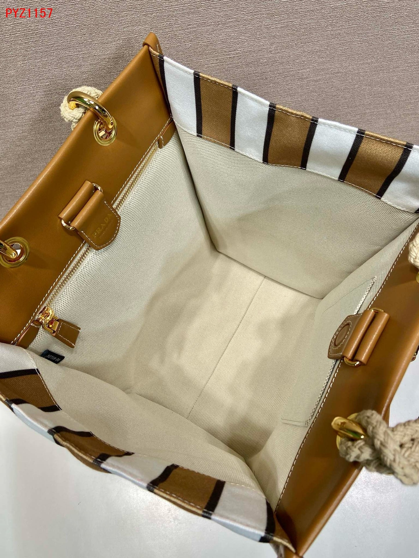 Prada Large printed canvas and leather tote bag