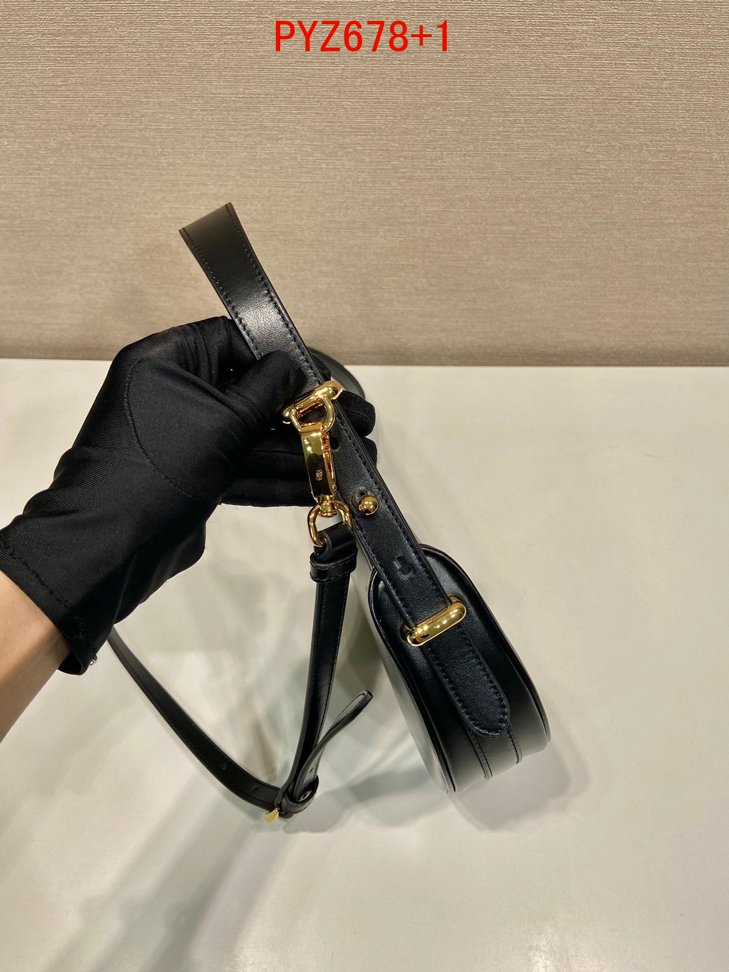 Prada Arqué leather mini shoulder bag