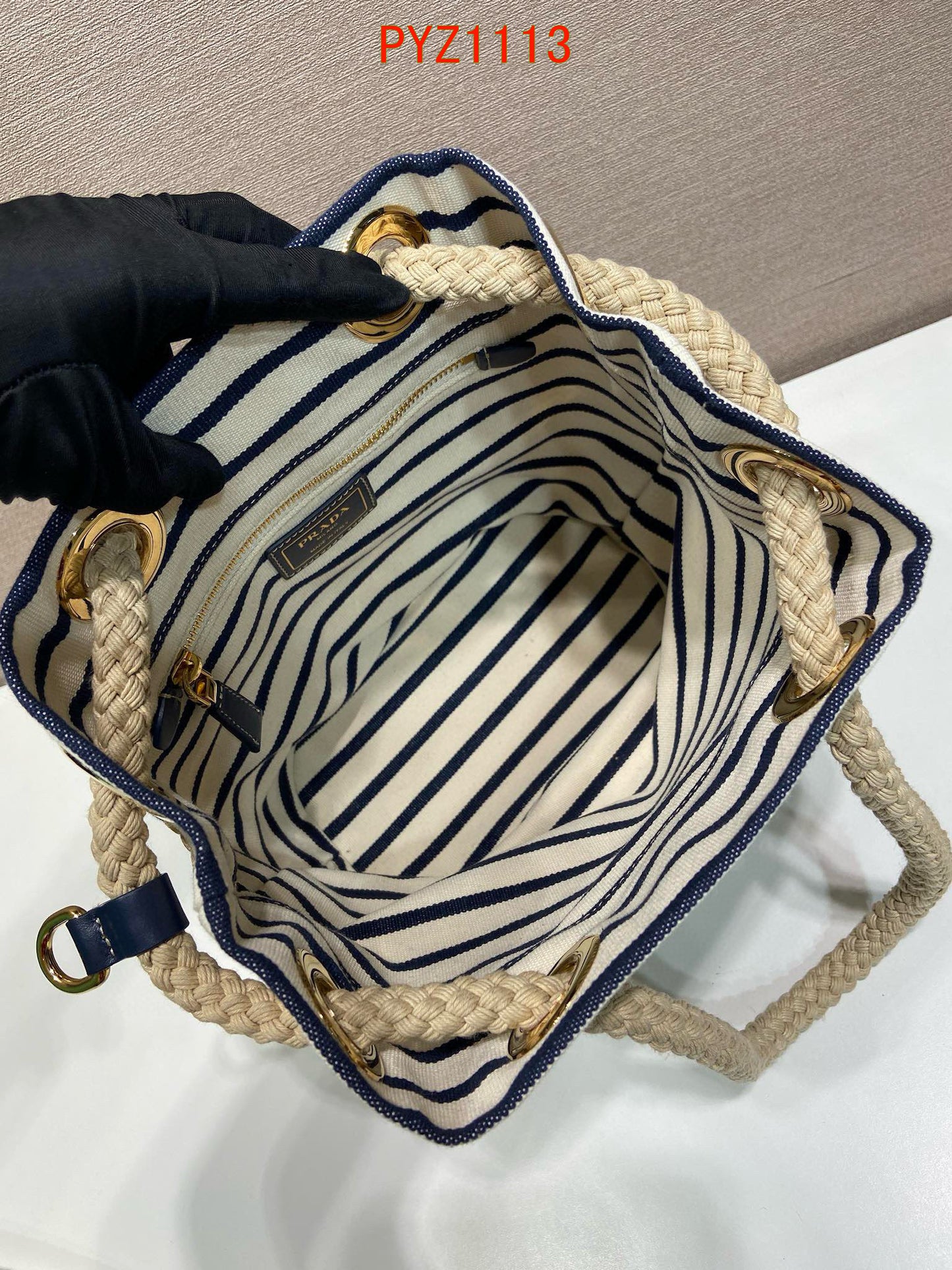 Prada Mariner small striped fabric bucket bag