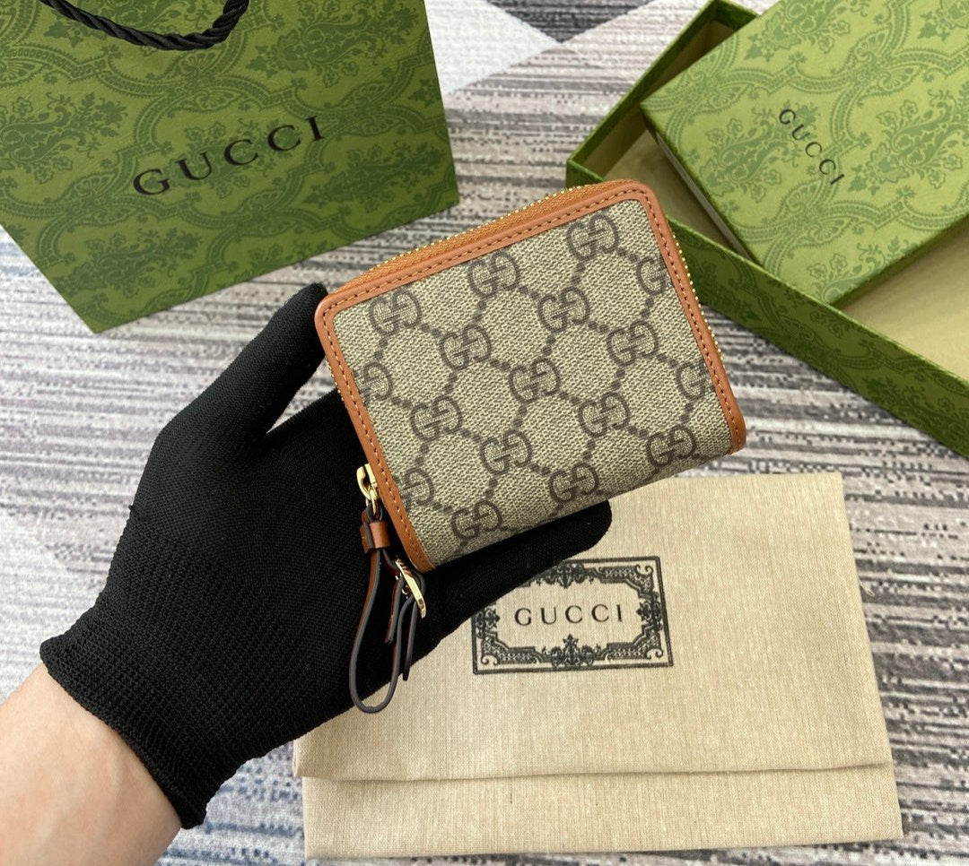 Gucci GG Emblem zip mini wallet