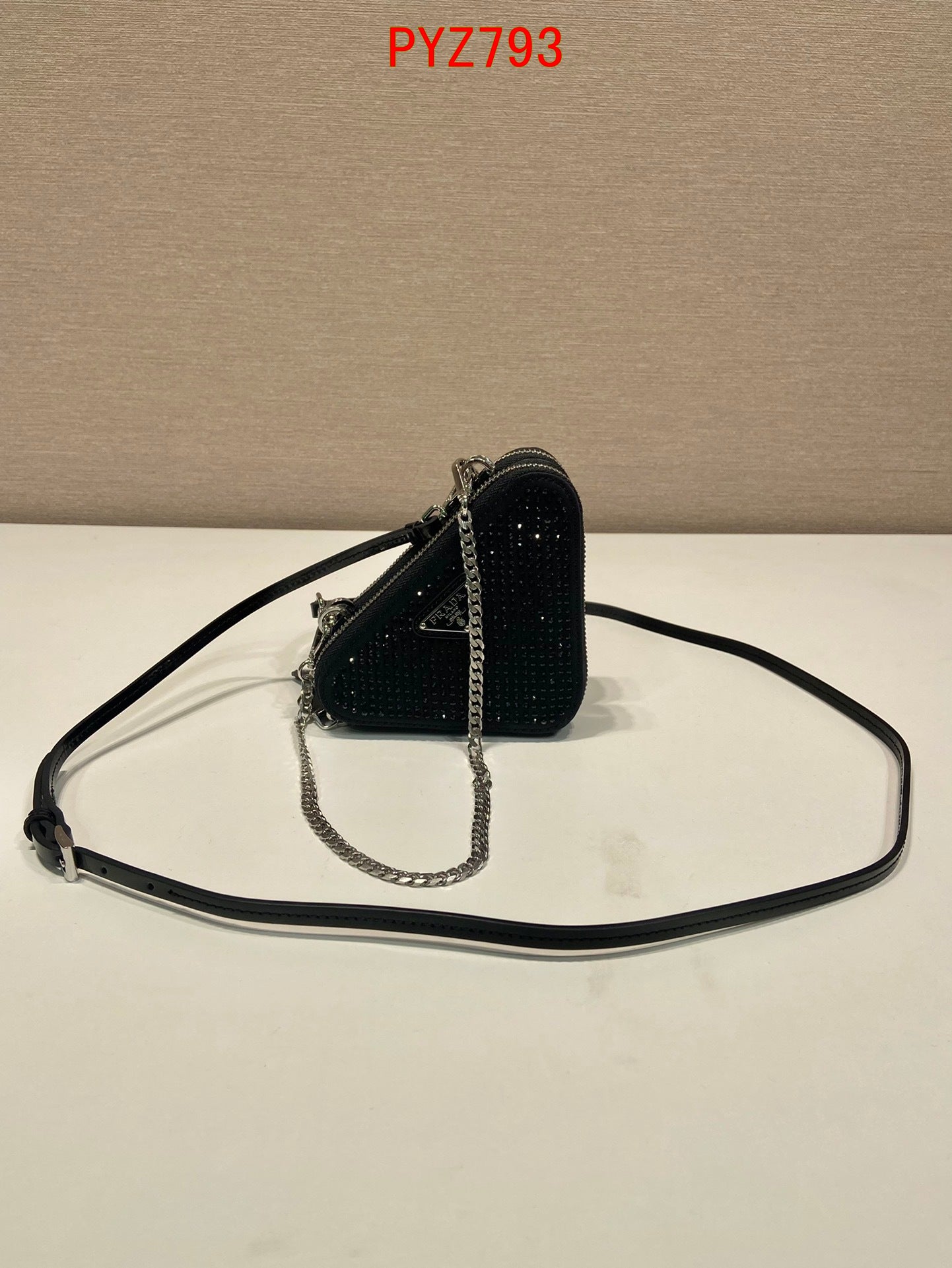 Prada Triangular embellished satin and leather mini-pouch