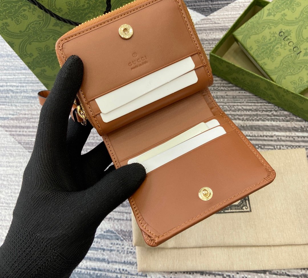 Gucci GG Emblem zip mini wallet