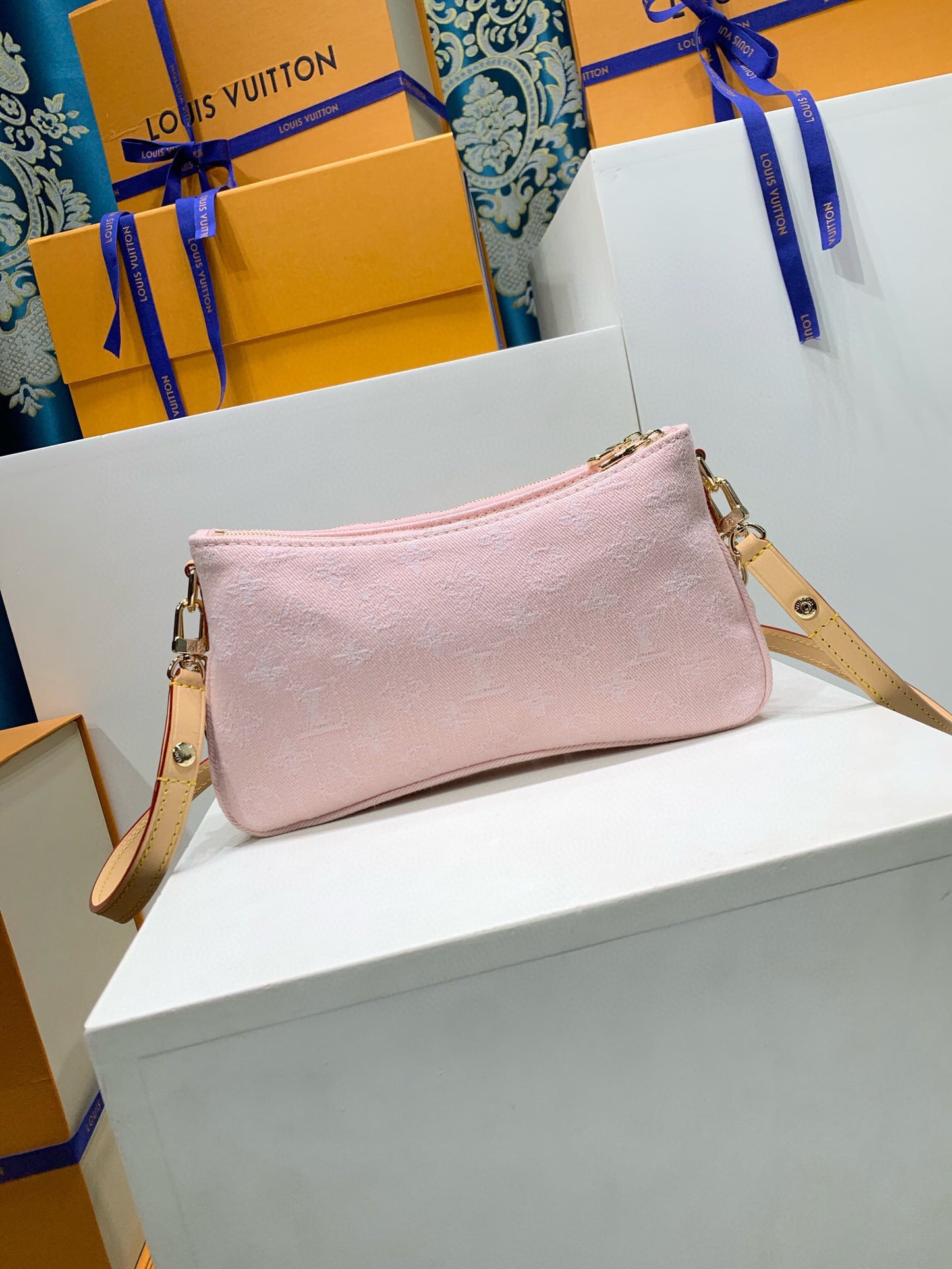 Louis Vuitton Liv Pochette denim pink