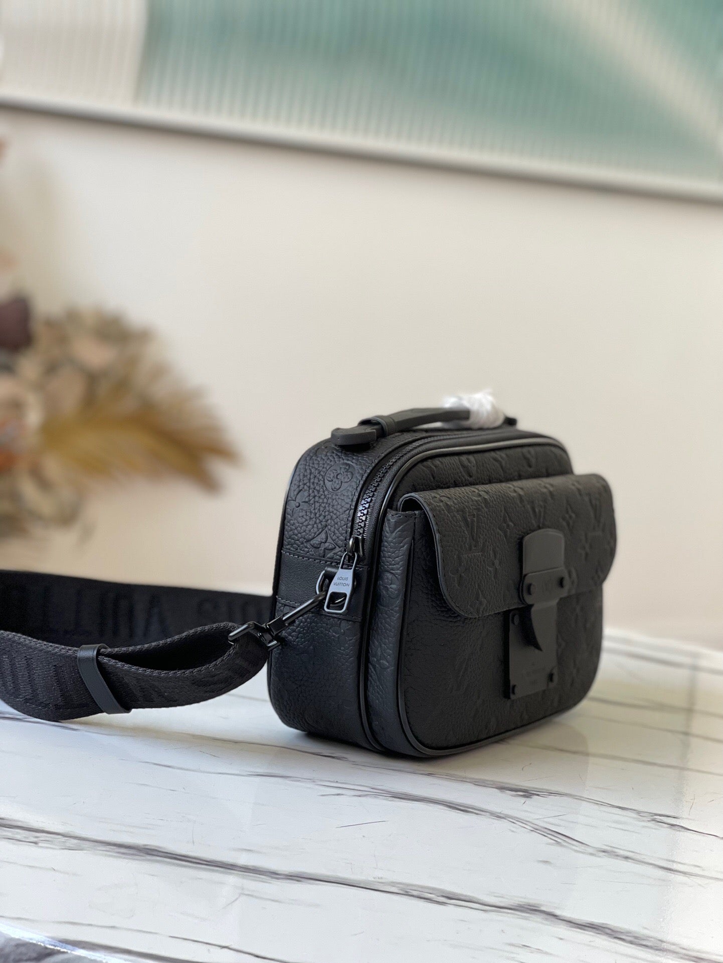 Louis Vuitton S lock Messenger bag