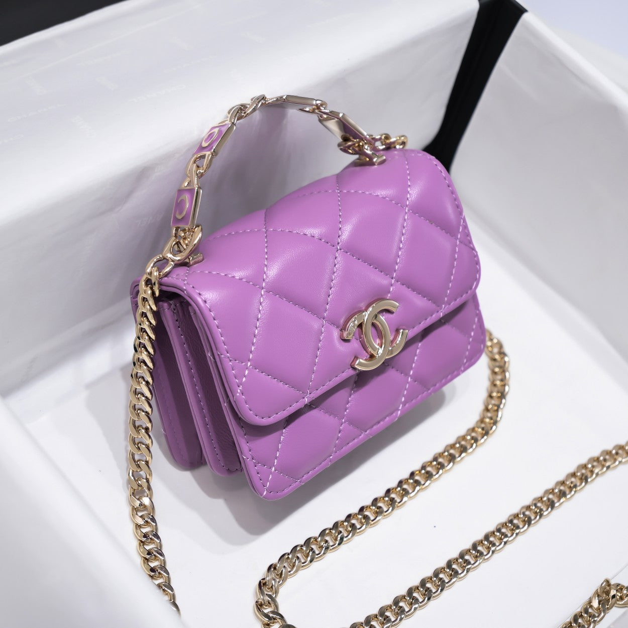 Chanel WOC mini with top handle