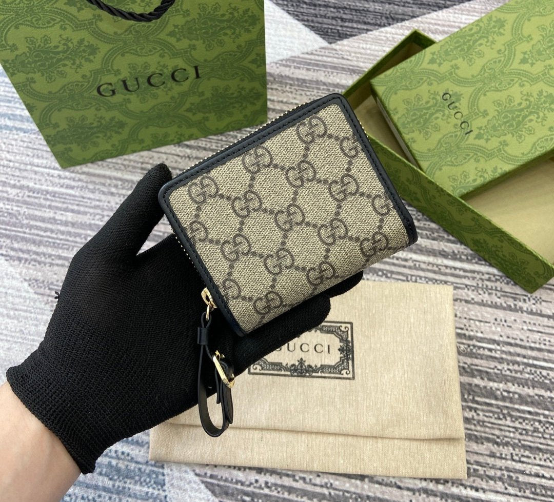 Gucci GG Emblem zip mini wallet