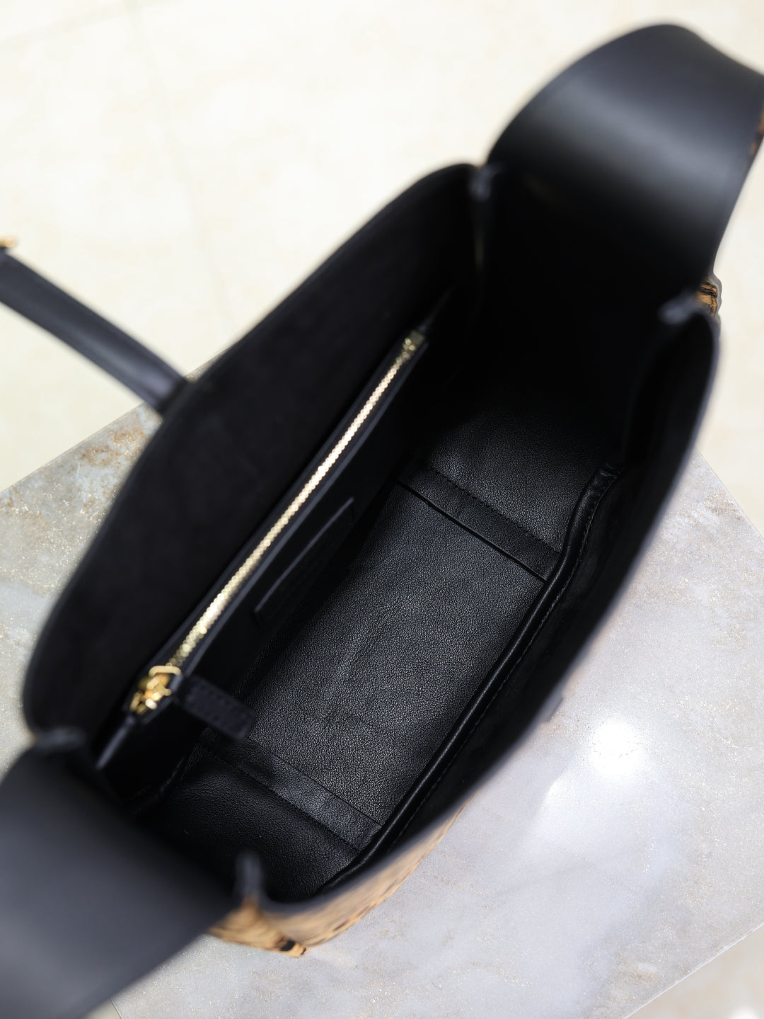 YSL LE 5 A 7 in leopard print