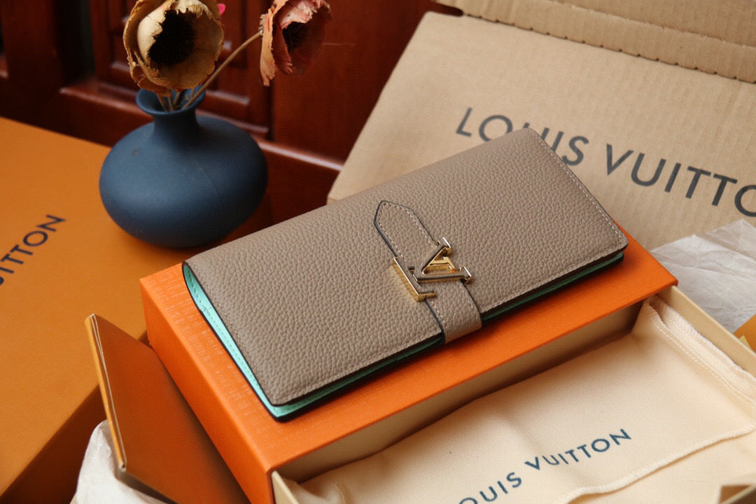 Louis Vuitton VERTICAL WALLET Taurillon leather