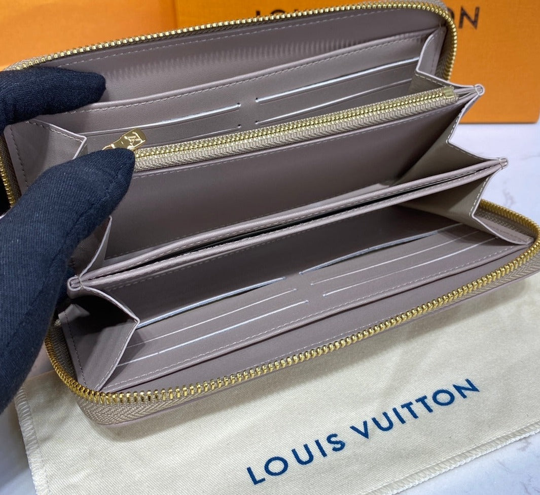 Louis Vuitton Coussin Zippy Wallet
