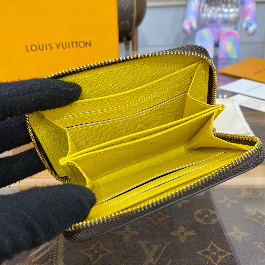 Louis Vuitton Zippy Coin Purse Vivienne Holidays collection