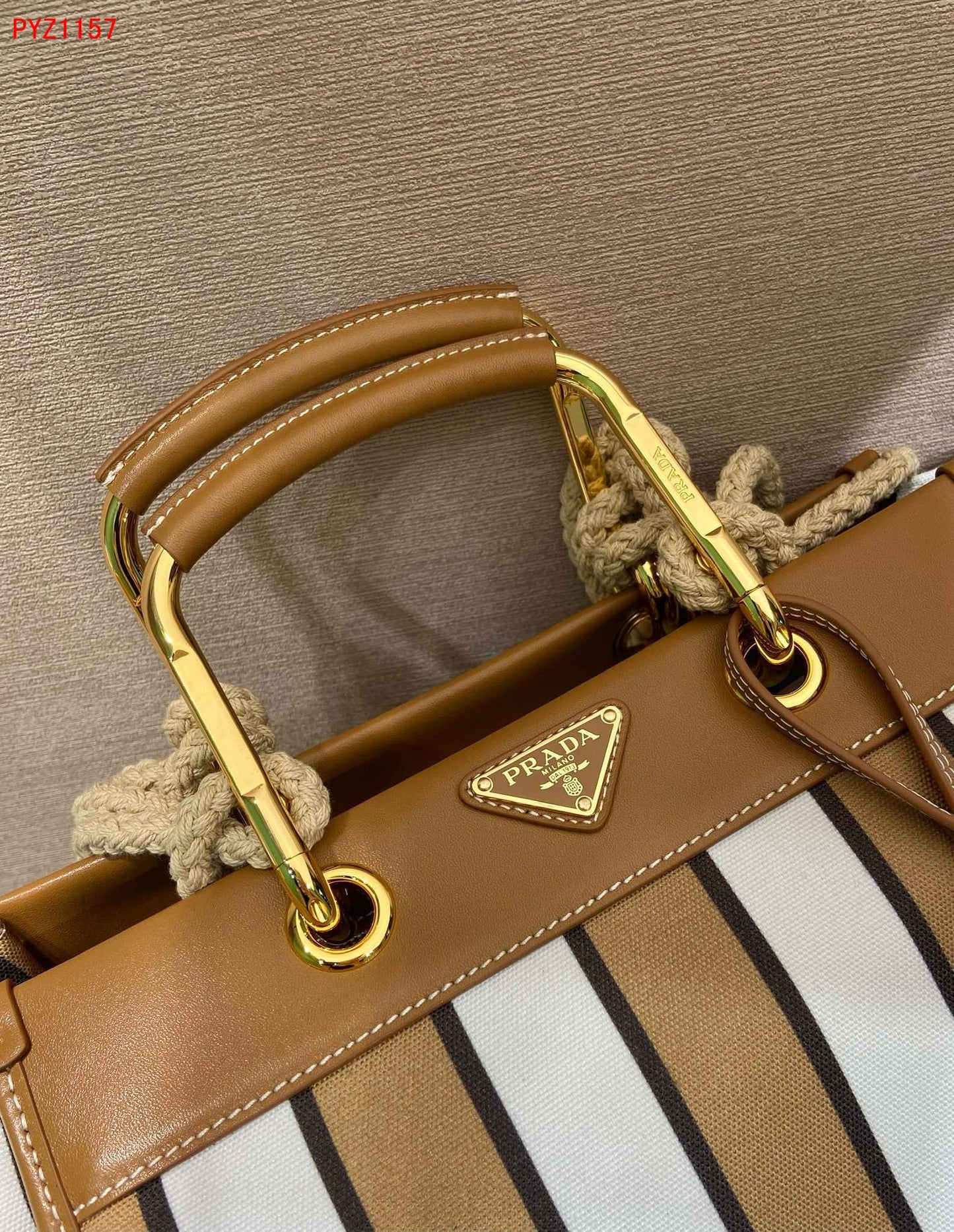 Prada Large printed canvas and leather tote bag