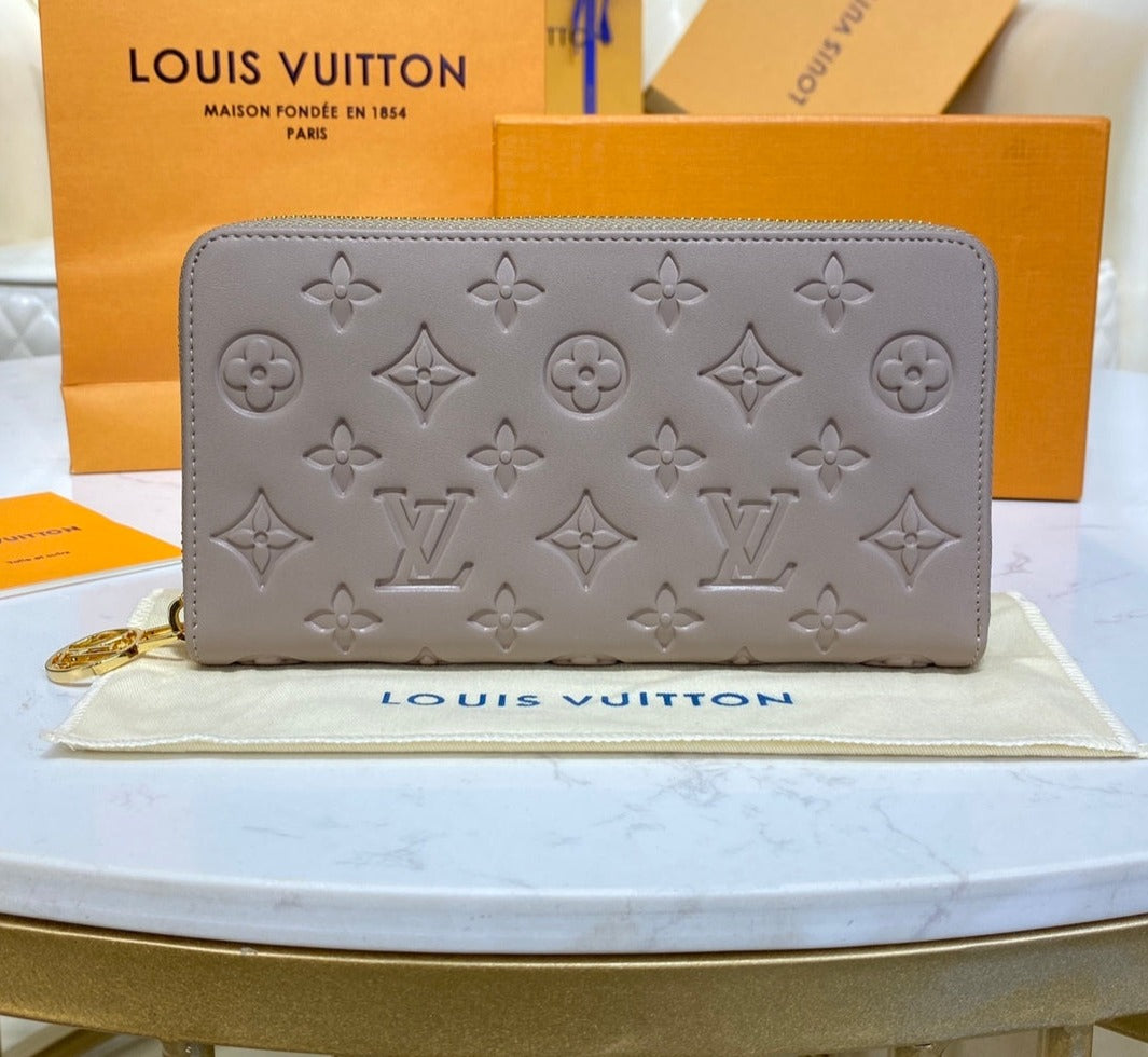 Louis Vuitton Coussin Zippy Wallet