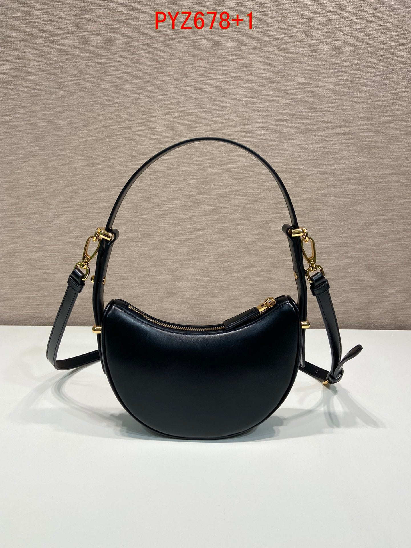 Prada Arqué leather mini shoulder bag