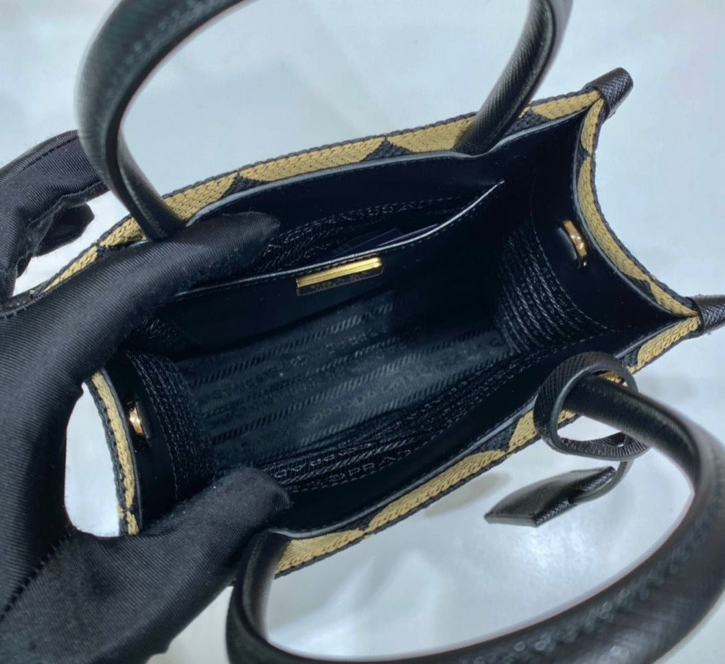 Prada Symbole embroidered fabric mini bag