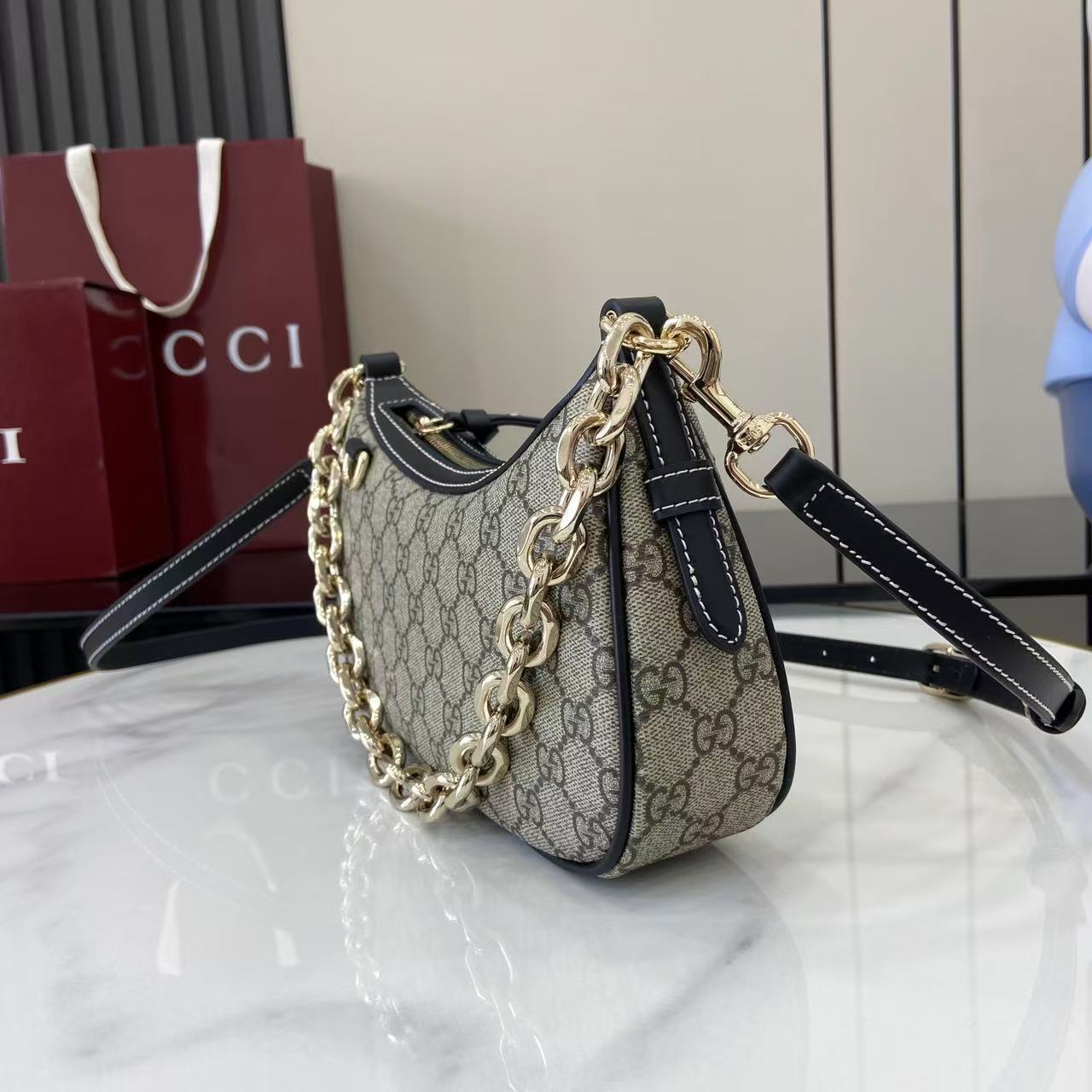Gucci Emblem small shoulder bag with chain