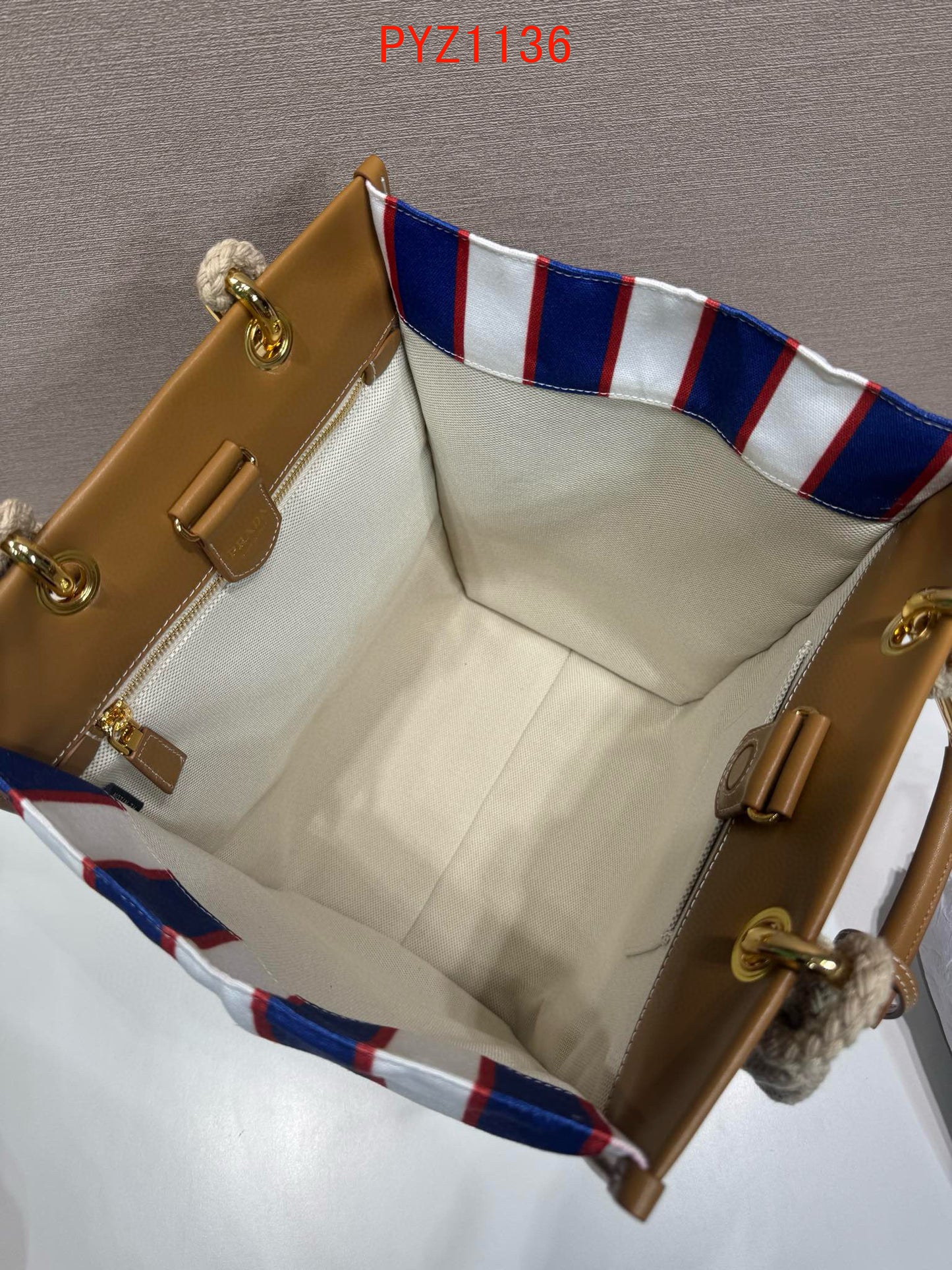 Prada Large printed canvas and leather tote bag