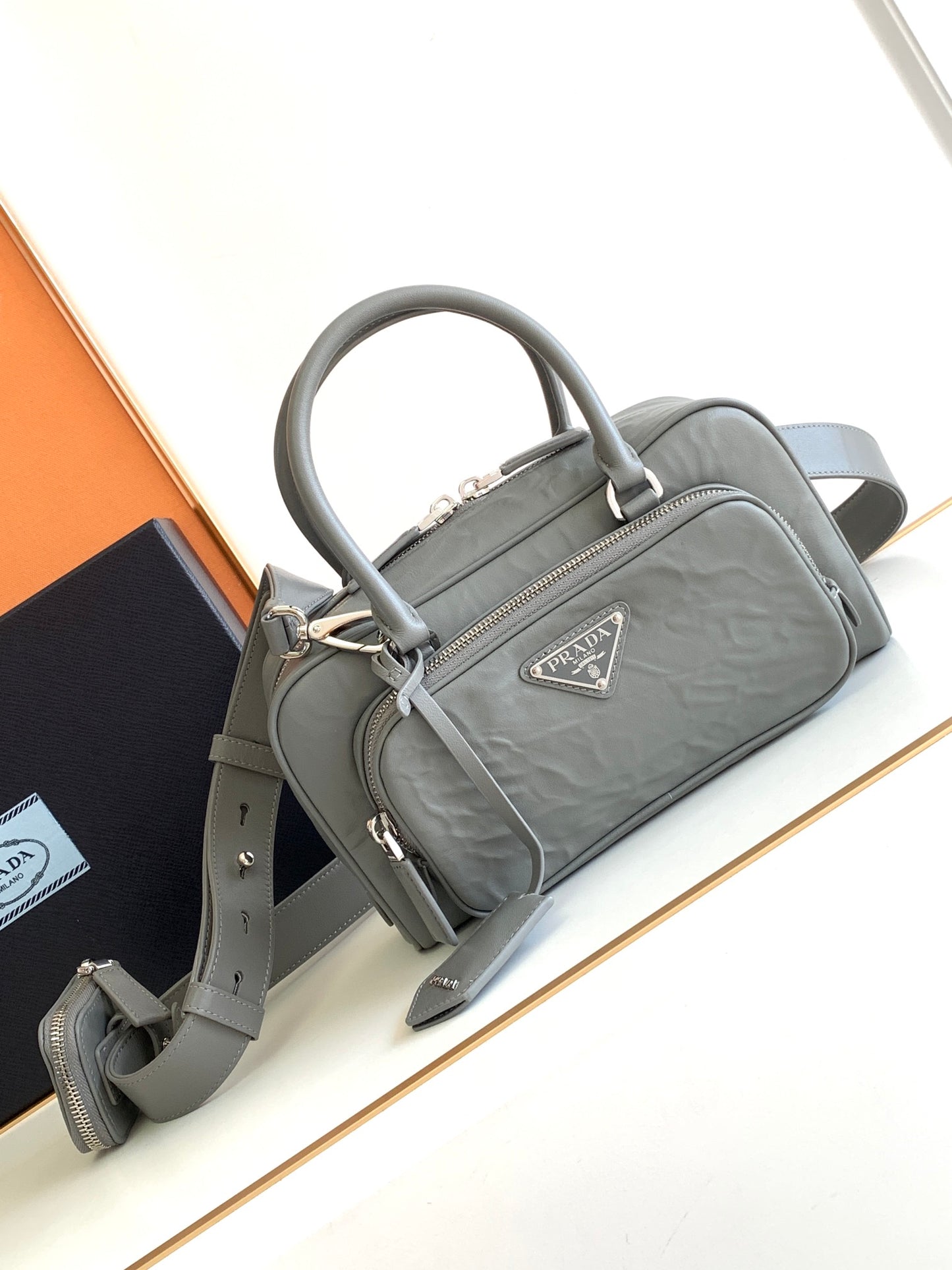 Prada Antique nappa leather multi-pocket top-handle bag
