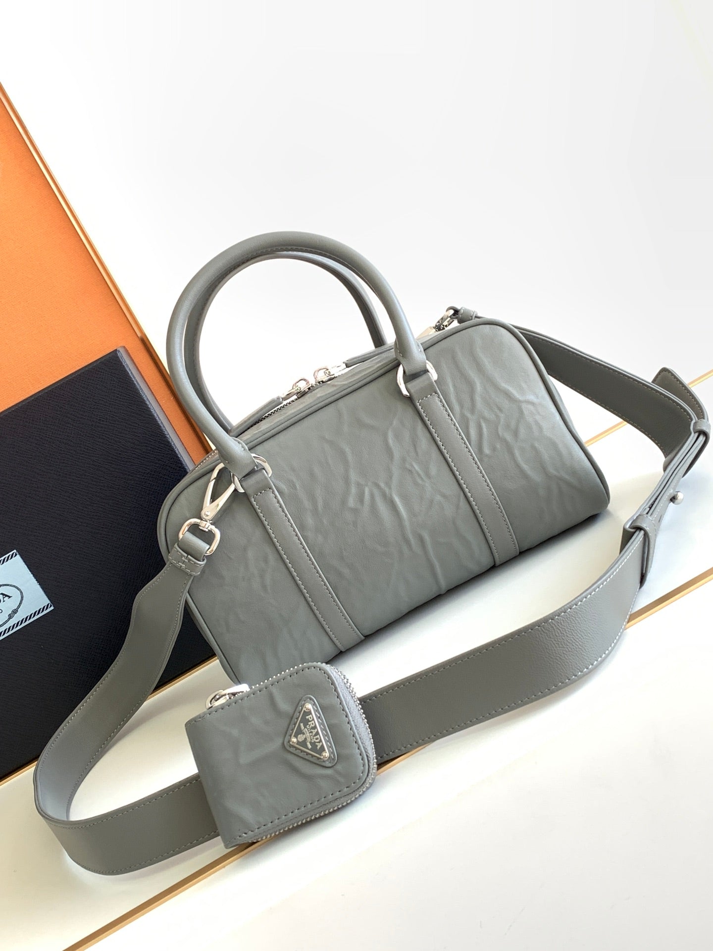 Prada Antique nappa leather multi-pocket top-handle bag