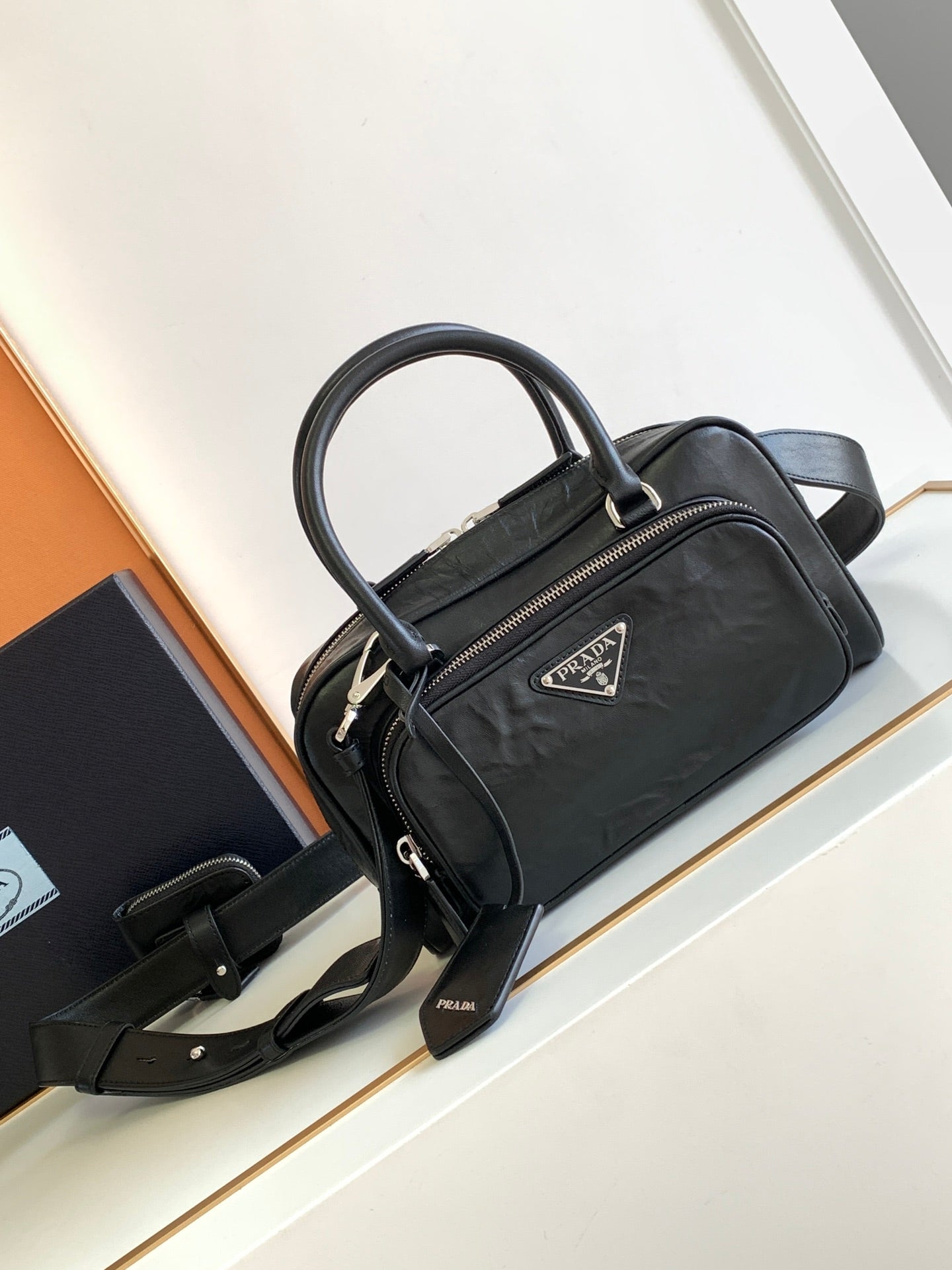 Prada Antique nappa leather multi-pocket top-handle bag