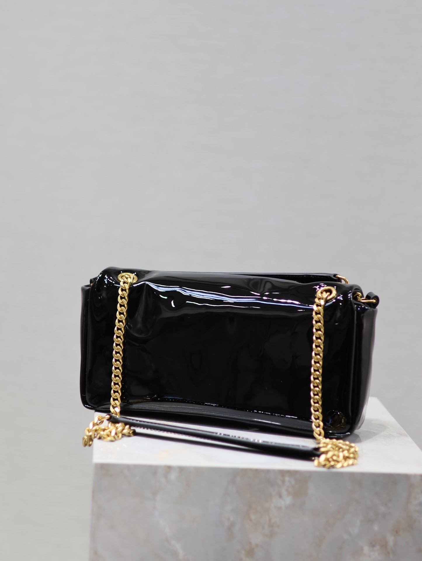 YSL Calypso patent leather bag