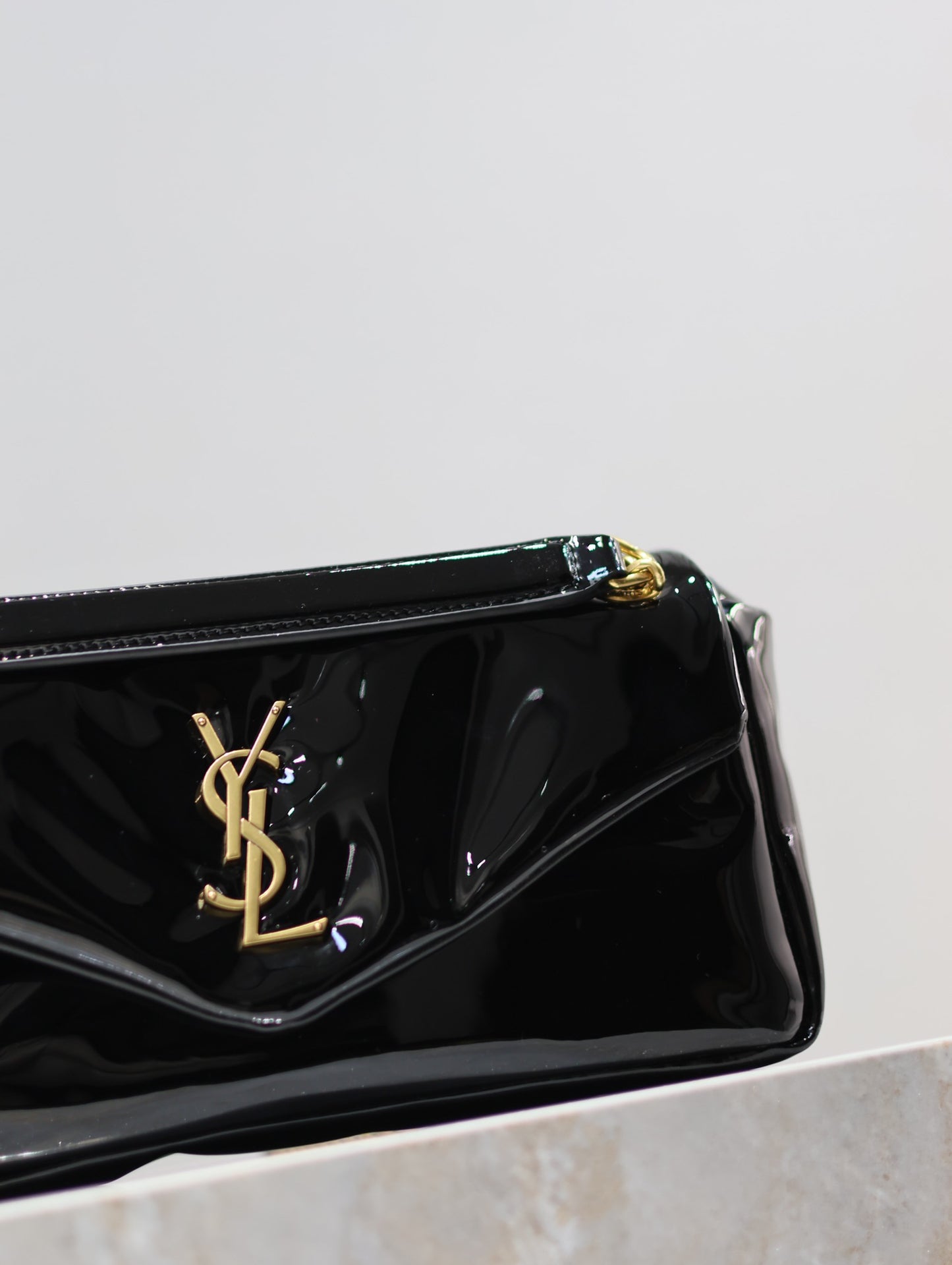 YSL Calypso patent leather bag