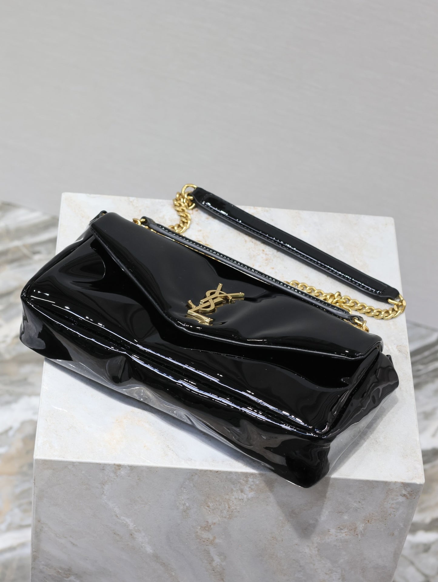 YSL Calypso patent leather bag