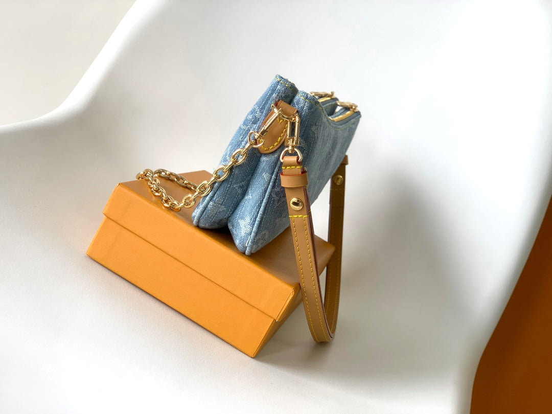 Louis Vuitton Denim Liv Pochette bag