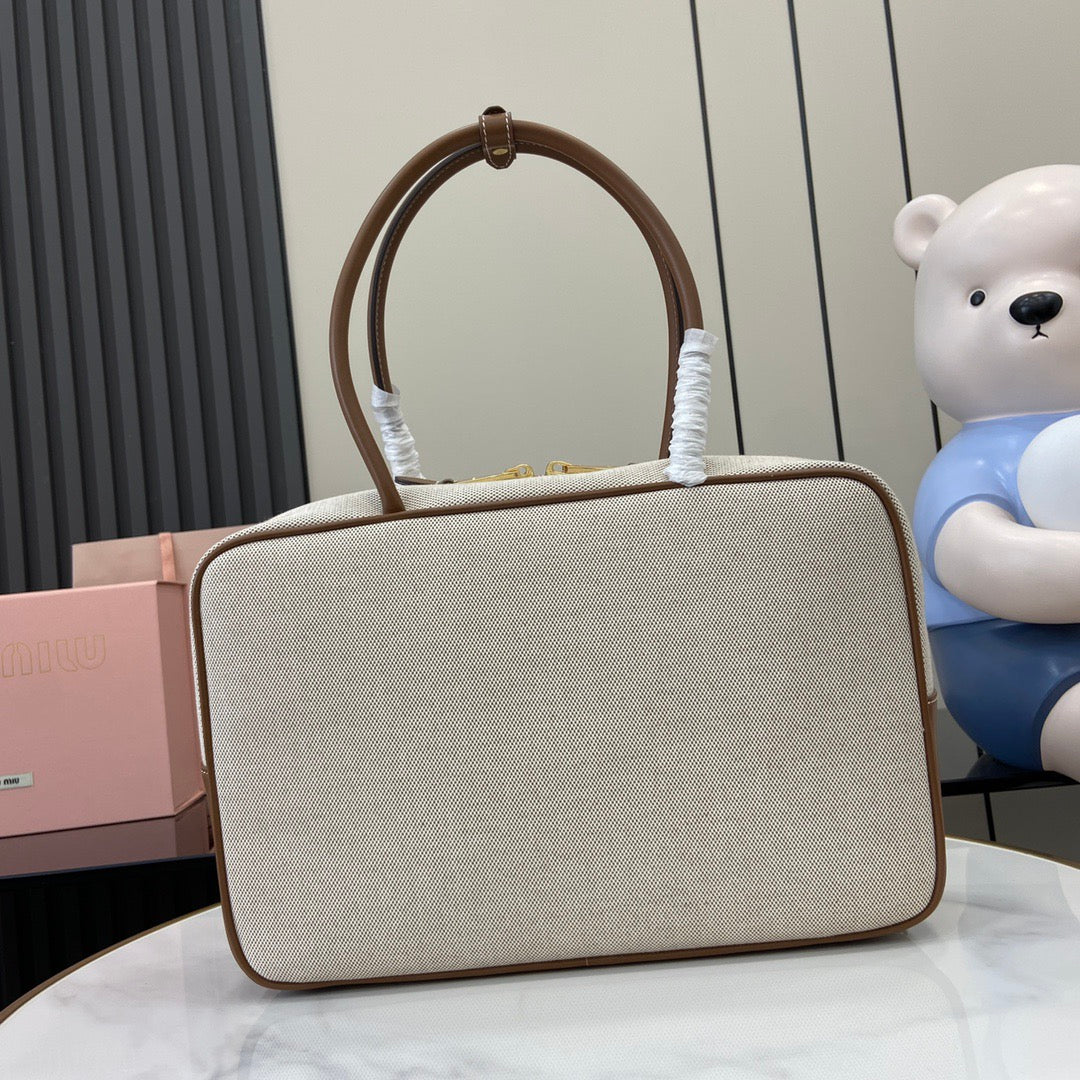Miu Miu Beau Top handle Canvas bag