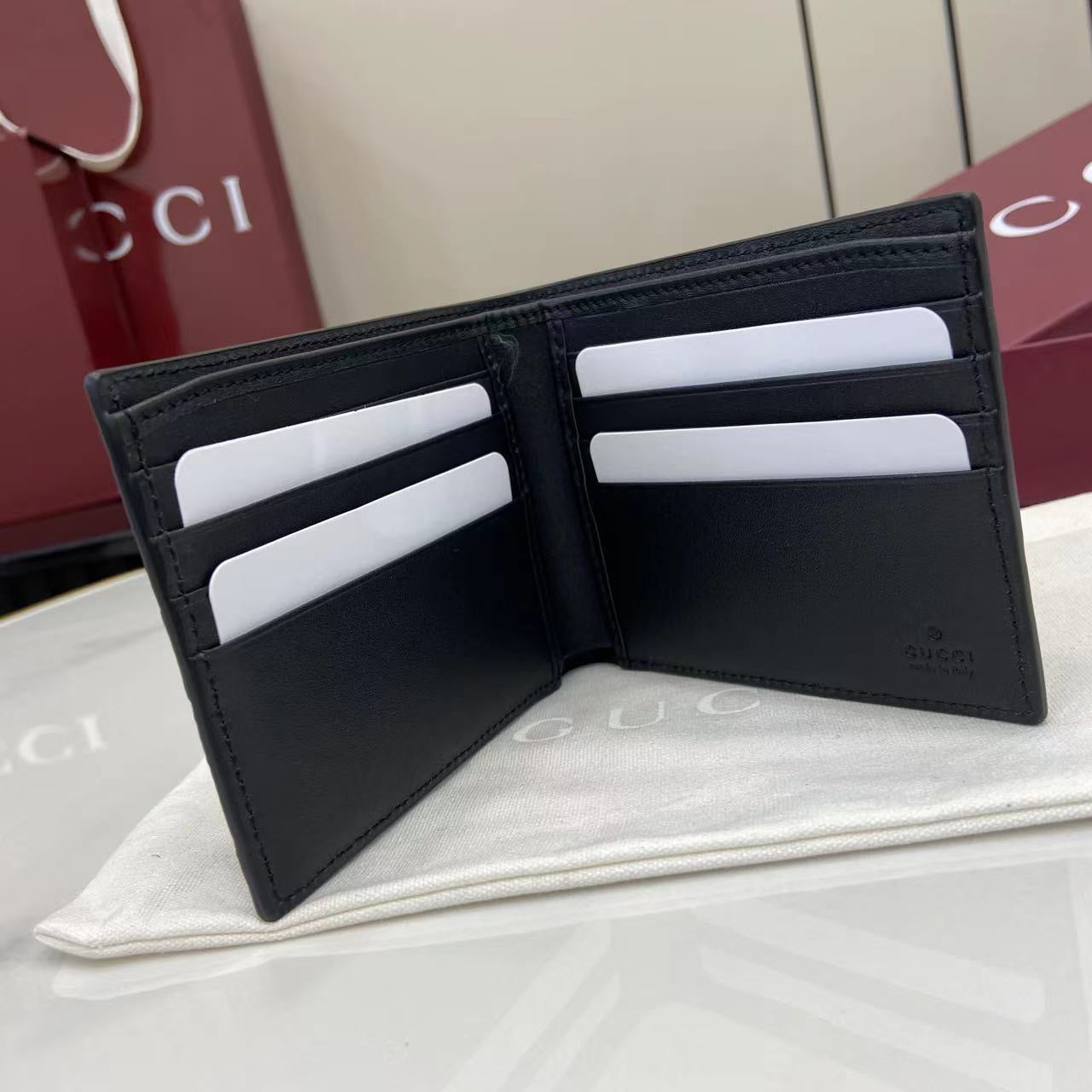 Gucci Imprint bi-fold wallet