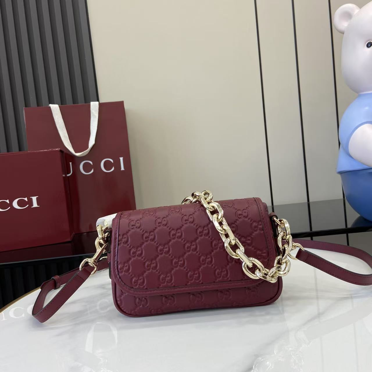 Gucci GG Emblem small shoulder bag