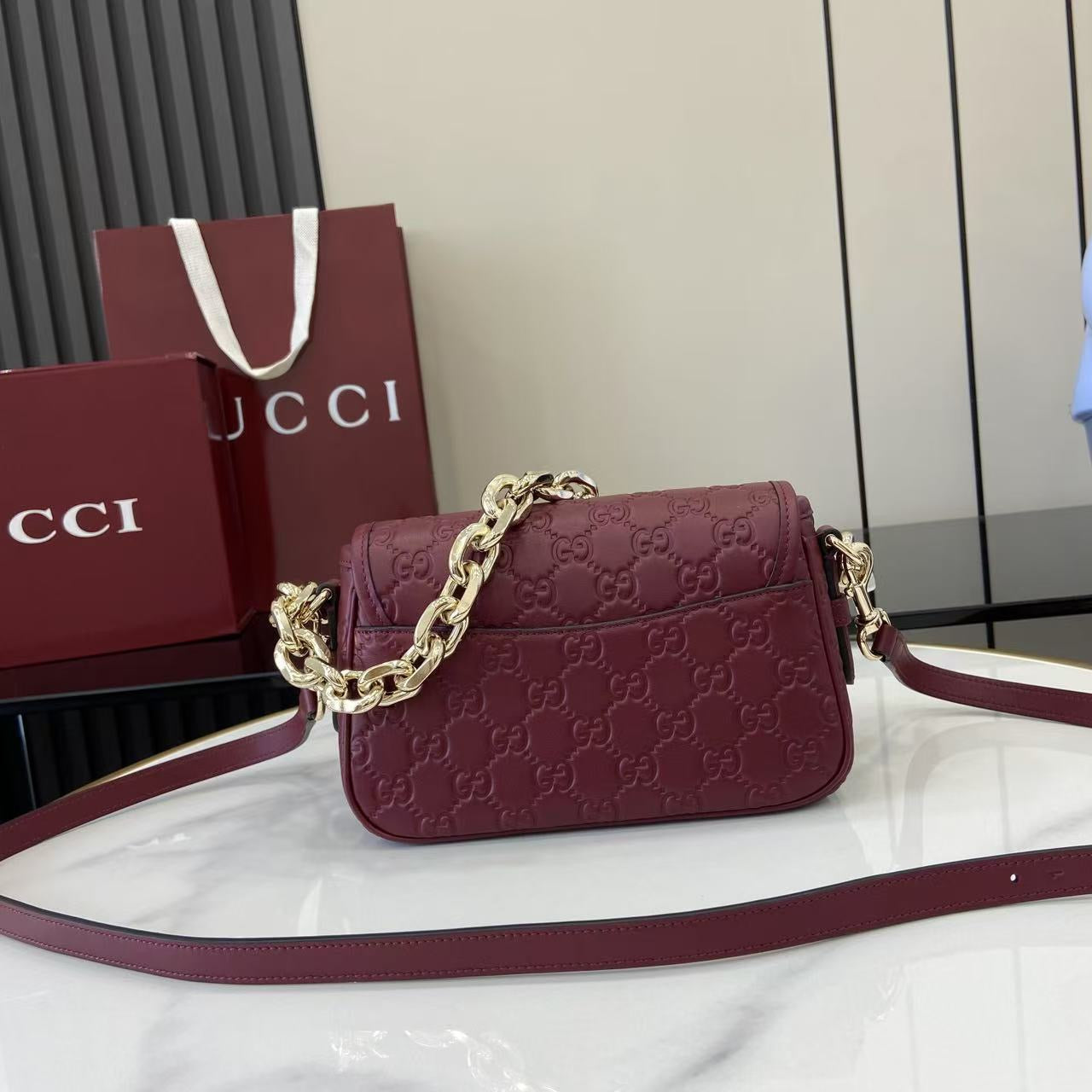 Gucci GG Emblem small shoulder bag