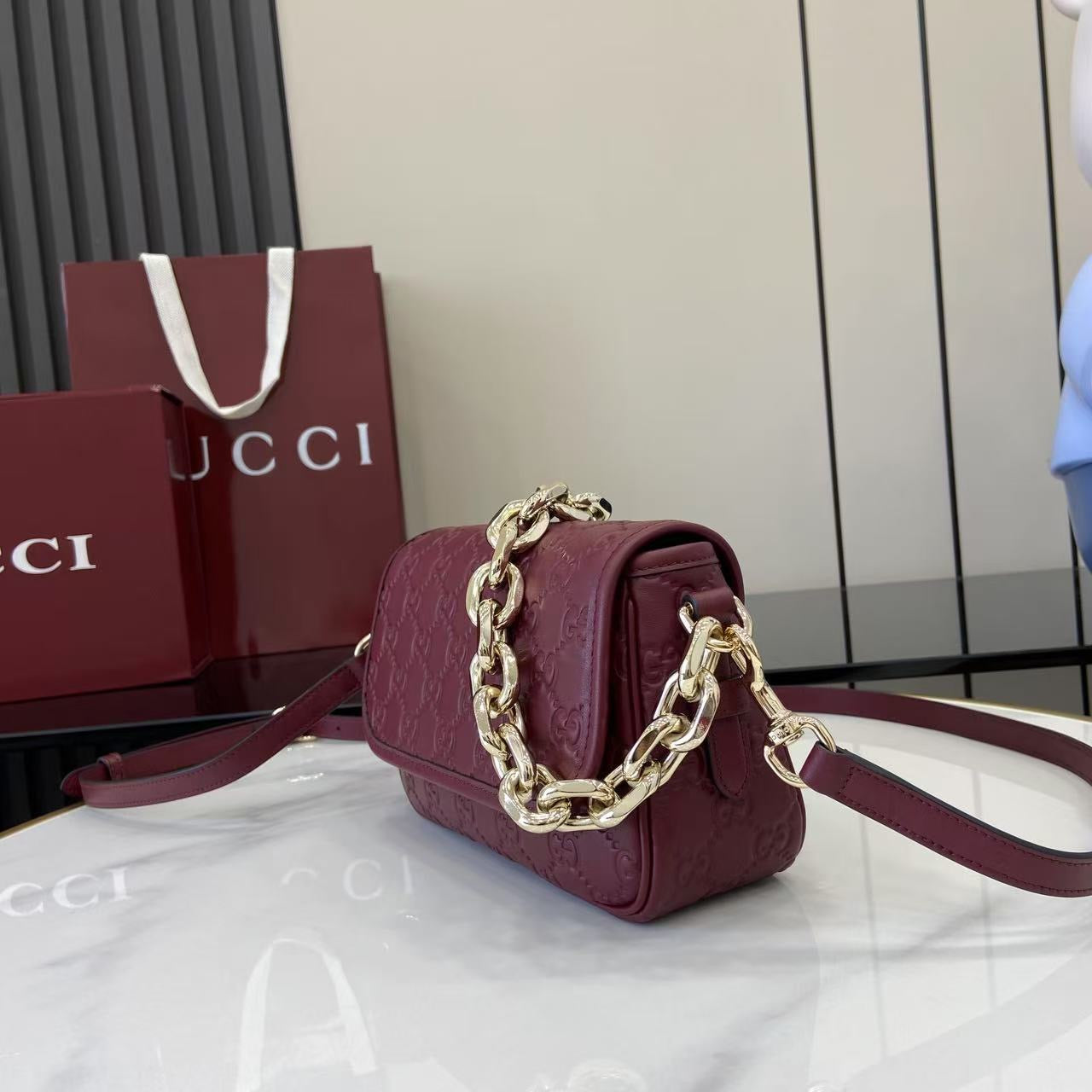 Gucci GG Emblem small shoulder bag
