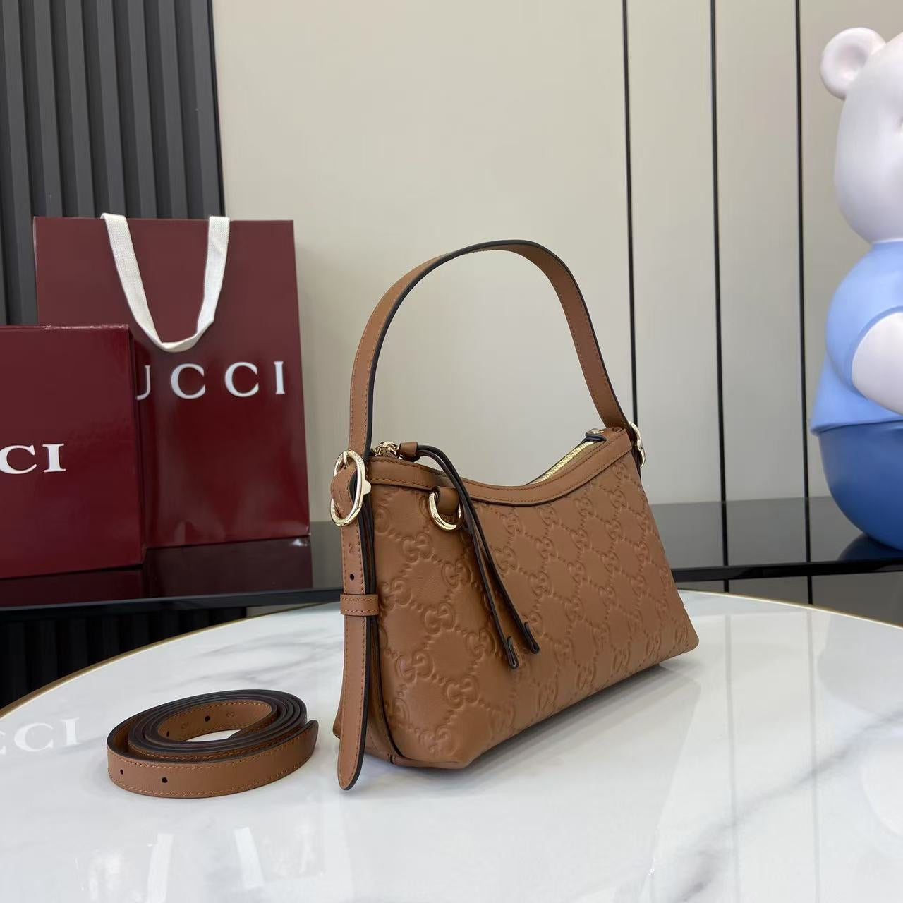 Gucci GG Emblem small shoulder bag